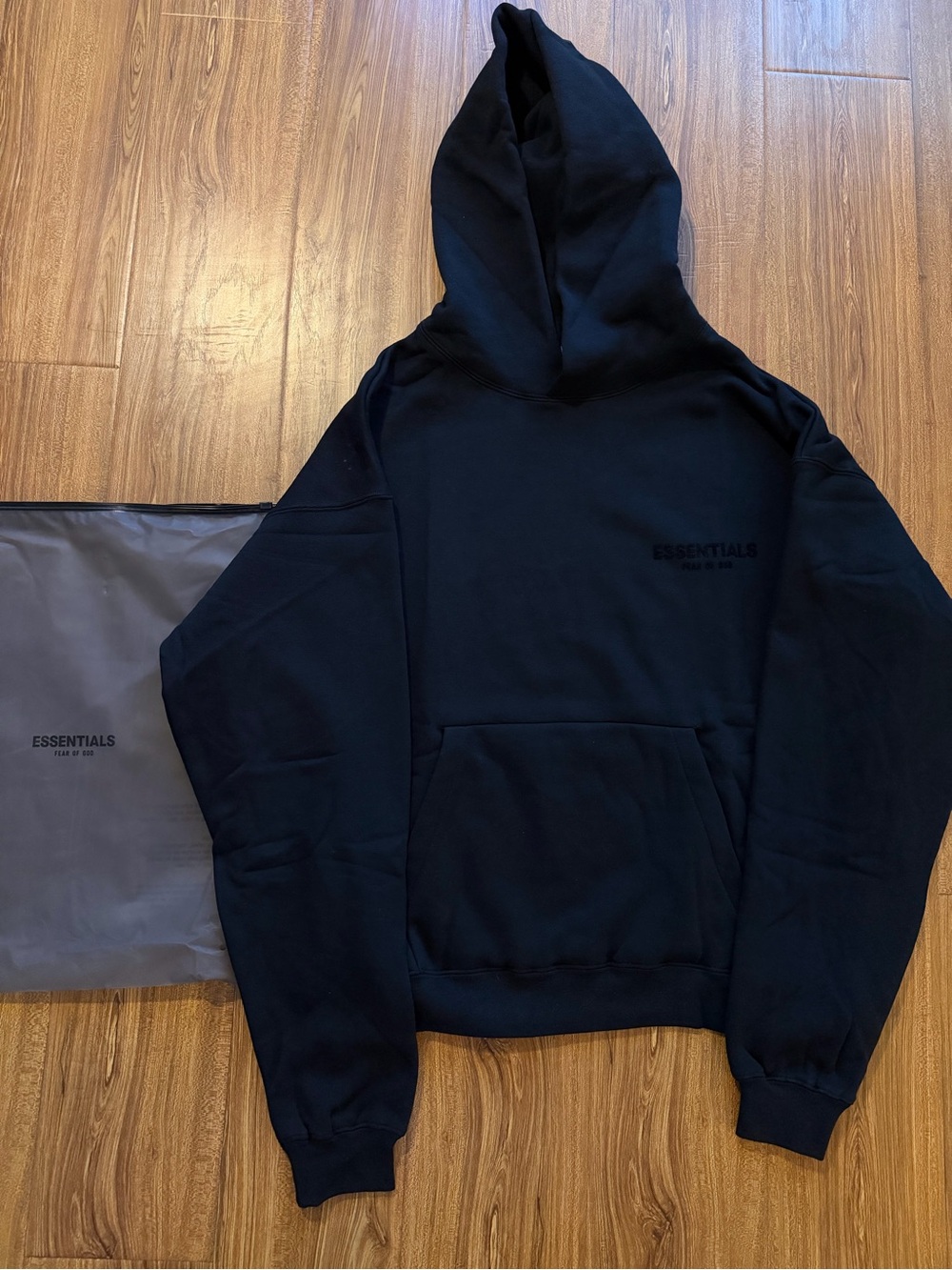 ESSENTIALS Black Men's Pullover Hoodie with Subtle Logo